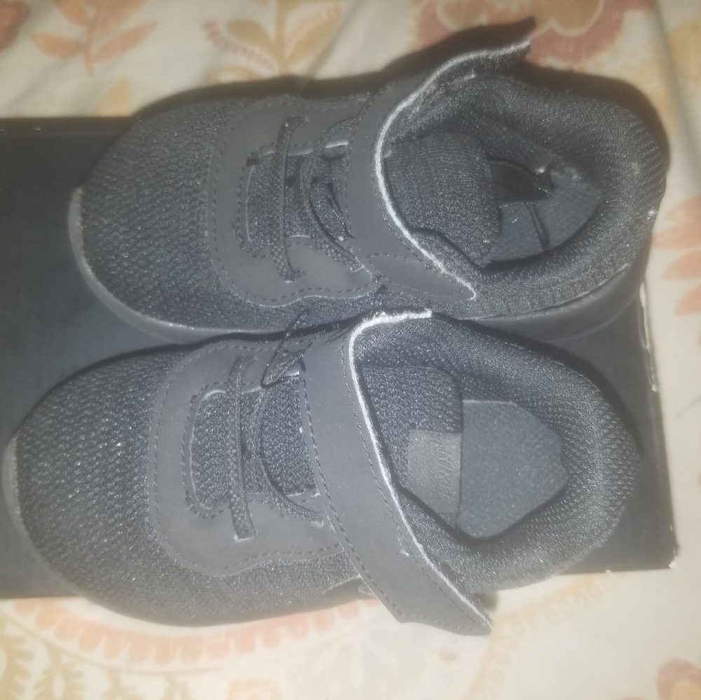 All black Nike Toddler Sneaker